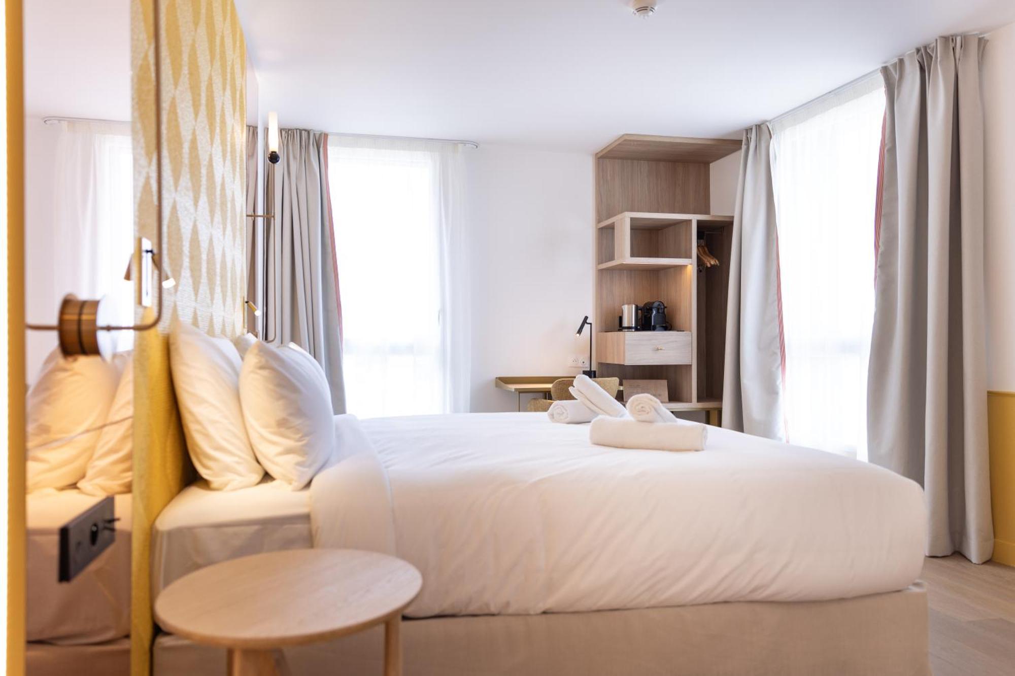 Hotel Kyriad Prestige Paris Asnieres Экстерьер фото